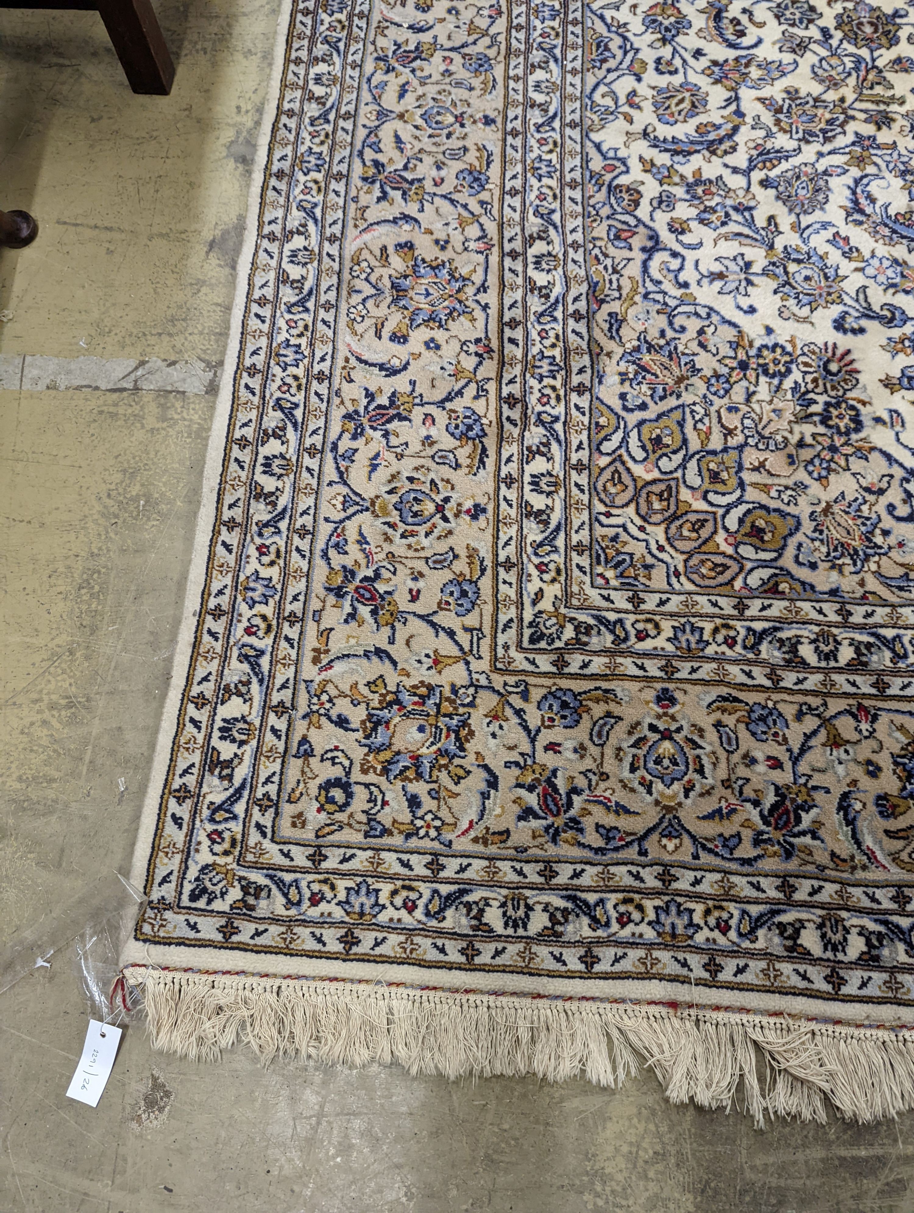 A Nain ivory ground carpet, 315 x 214cm